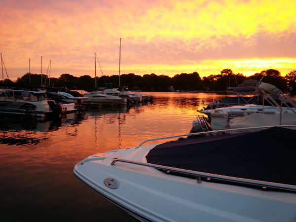 Sun setting over Lake Norman and boats at Morningstar Marinas Kings Point